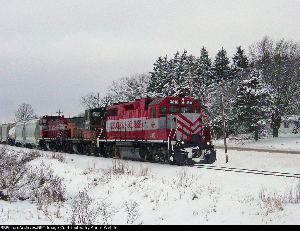 WSOR 3810 leads L249 past the snow-covered trees